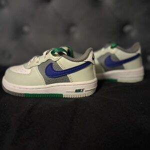 Nike Air Force 1. in Cream and Blue with Green Accents